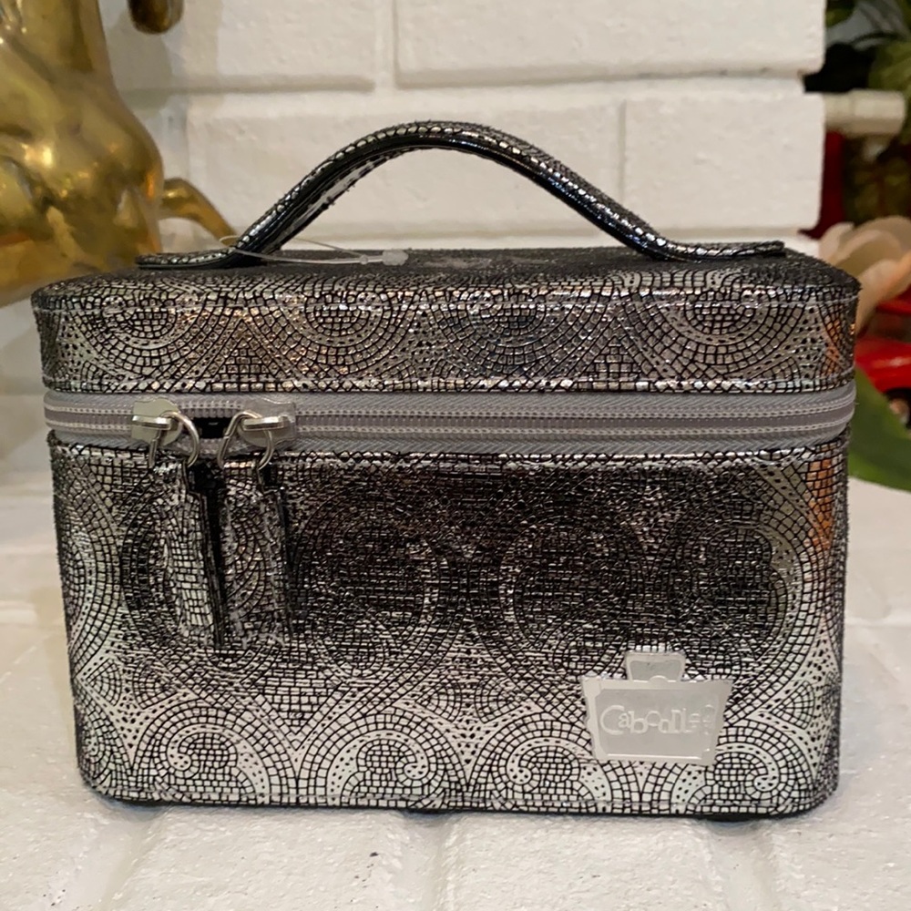 Beautiful Caboodle‘s make up box.